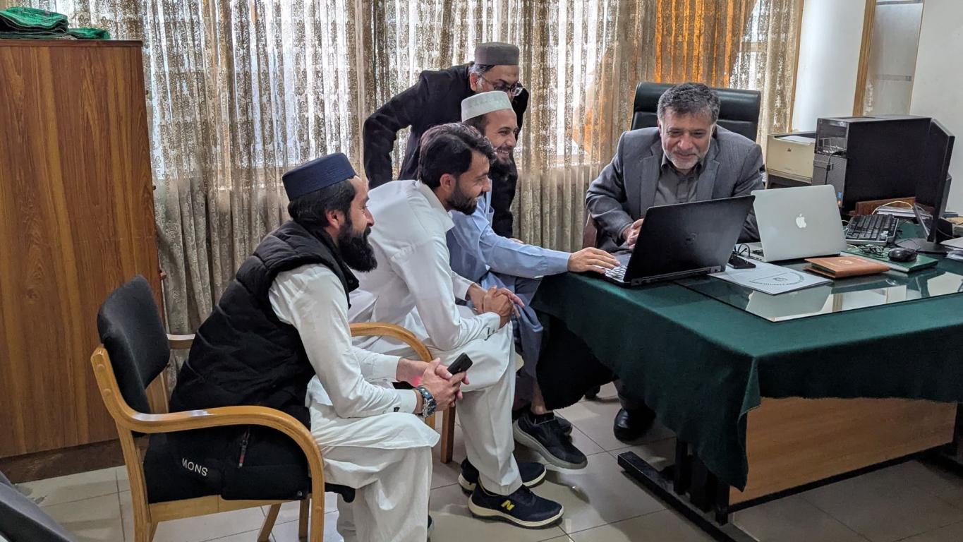 An image of fellows working in the government department